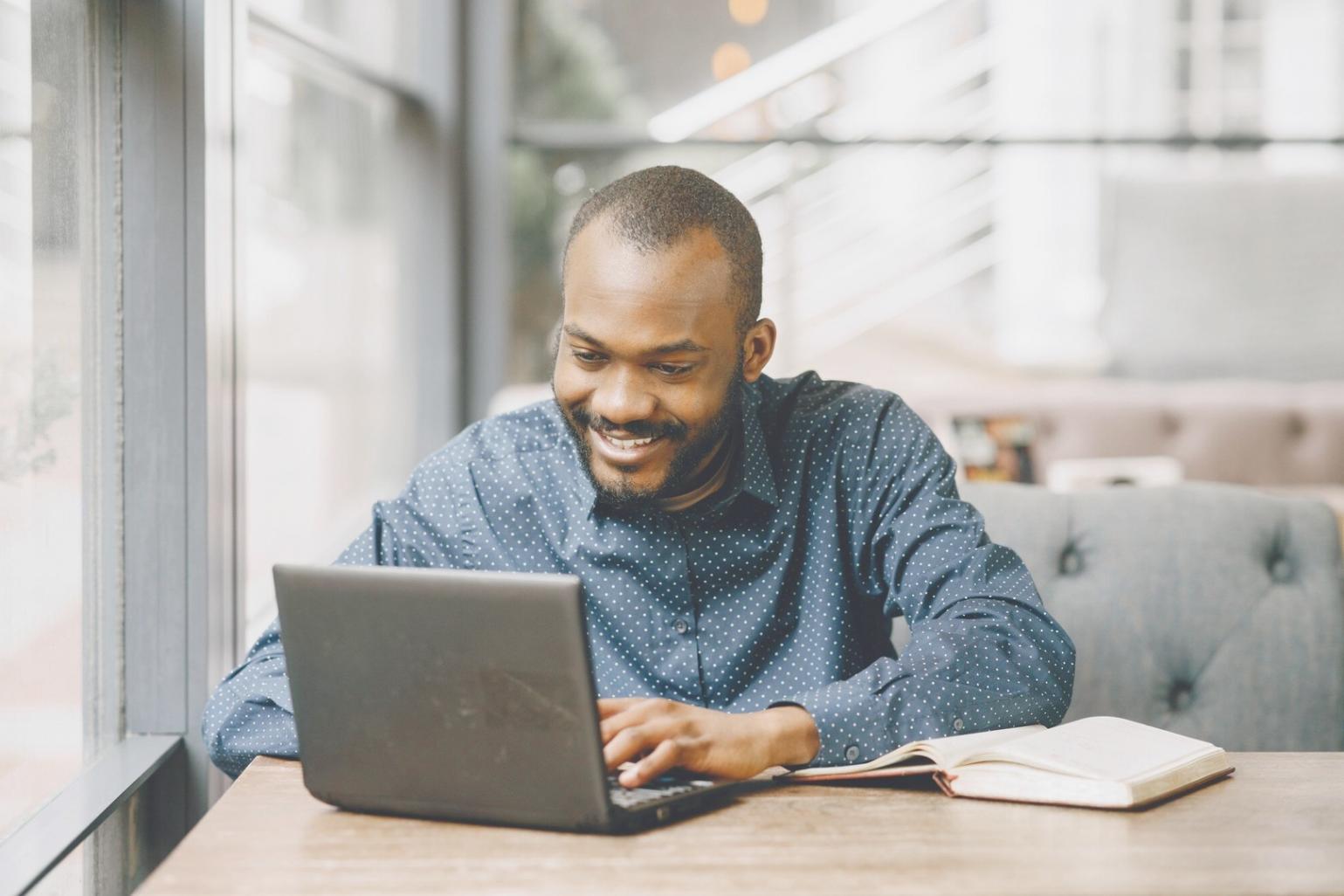 Students presenting their final web design projects to industry professionals