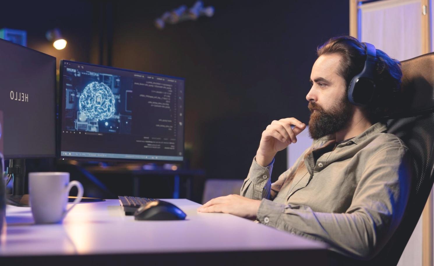 Modern computer setup displaying clean web design interface with multiple screens