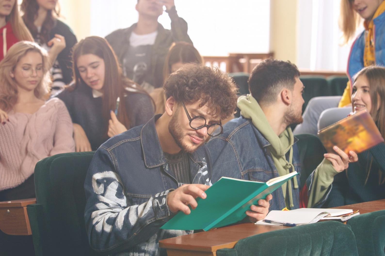 Modern web development workspace with multiple monitors showing code and design interfaces